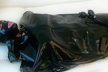 Girl Punished In Rubber Sleepsack - porn video