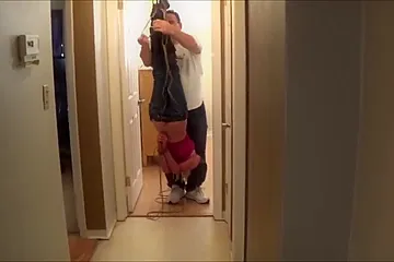 Blonde Captured And Suspended Upside Down - porn video