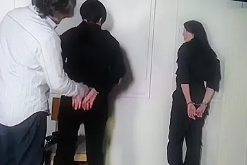 Two Policewoman Cuffed - porn video
