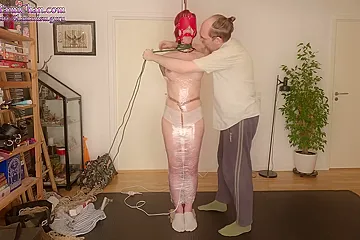 Girl Is Mummified In Plastic Wrap To Pole With Magic Wand - porn video