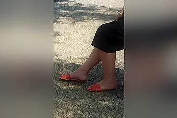 Candid Legs And Feet In Orange Sandals Of A Brunette Woman At The Bus - porn video