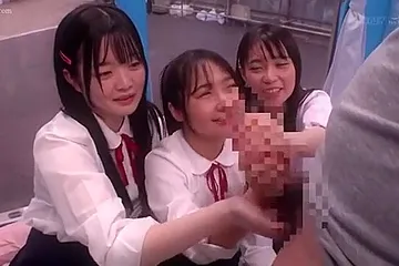 Three beautiful girls in uniform get excited when they see a man's penis and cum all over his hands. - porn video