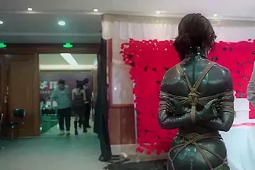 Chinese public supension bondage in latex - porn video
